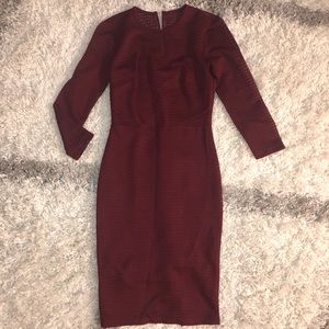 Gorgeous form-fitting read dress.